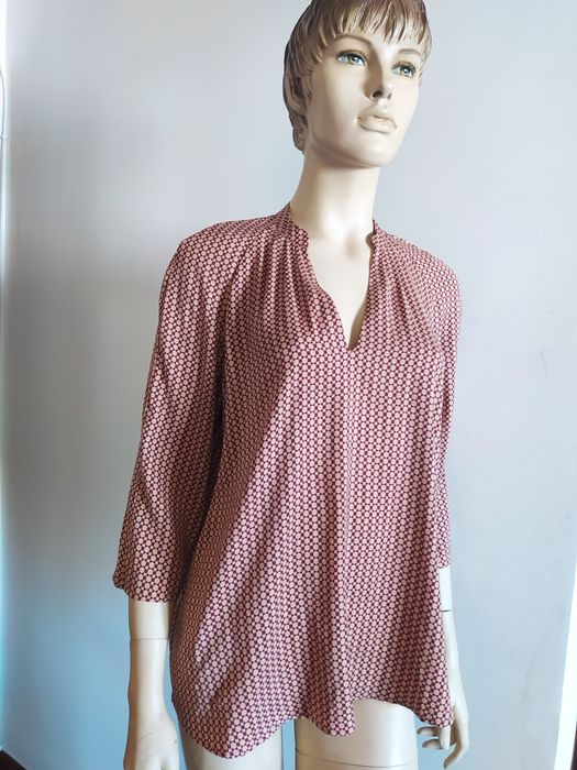 Camisa Como Nova. Tam. L a XL. Tons castanhos