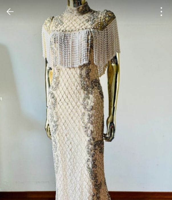 Przepiękną unikatowa sukienka firmy Karen Milen.