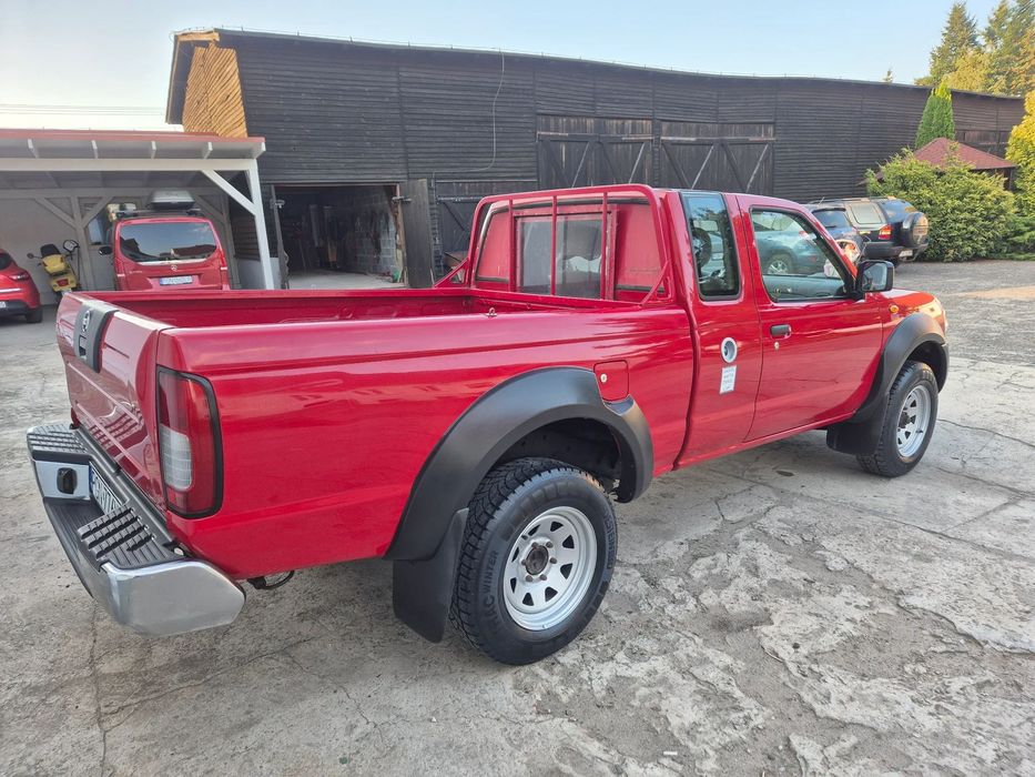 Nissan Navara 2.5di 133KM  klima, serwisowany Bez rdzy, prosto z DE Bardzo zadbany.