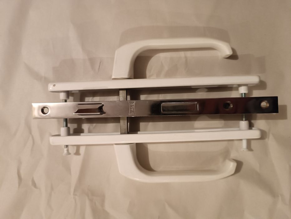 Замок з ручкою натискною дверною