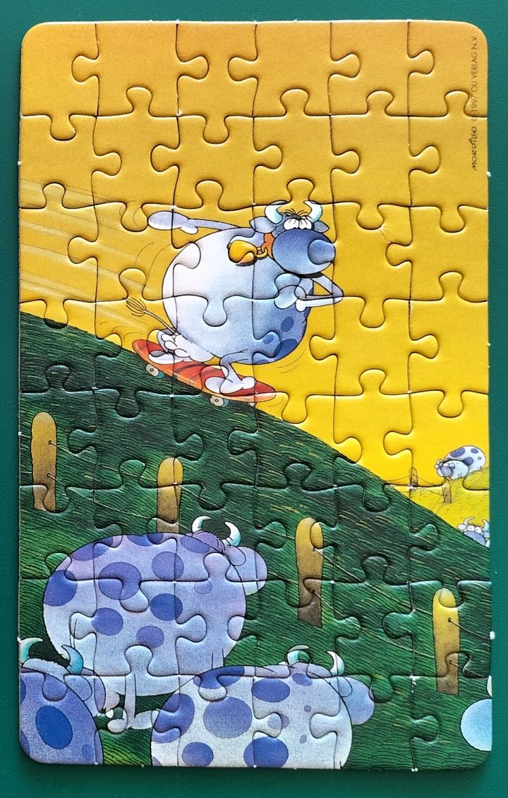 Raro Mini puzzle Heye Mordillo 48 peças