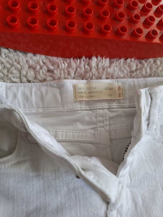 spodnie jeansowe- rurki dla dzieci: z dziurami i posnapane - Zara