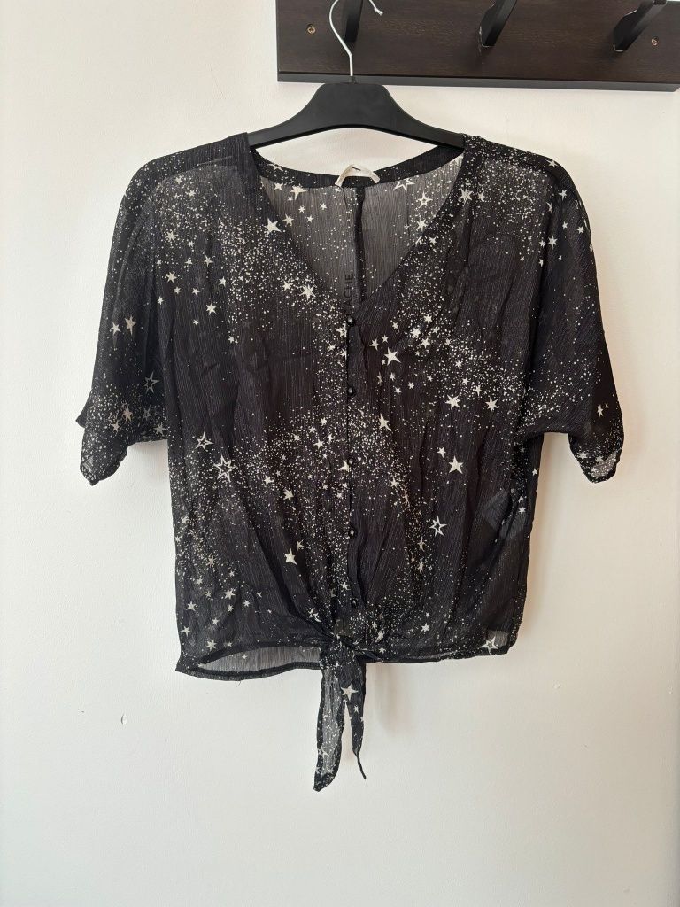 Camisa preta com estrelas