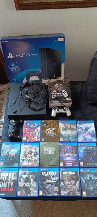 PS4 Pro 1TB com 2 comandos, auriculares e 14 jogos!