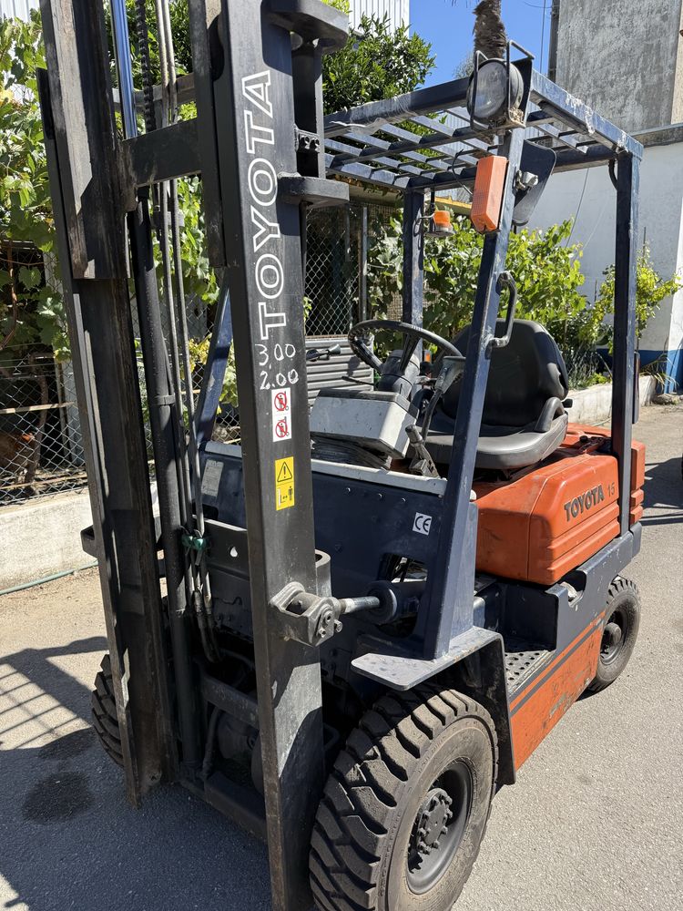 Empilhador toyota 1500 kgrs diesel motor novo