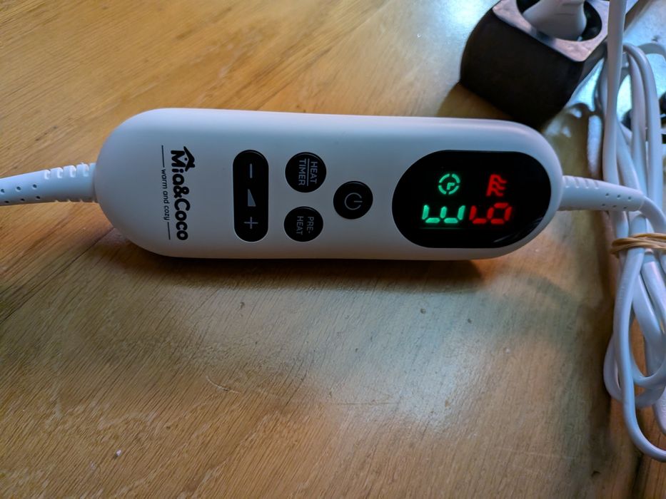 Cobertor elétrico cinzento aconchegante