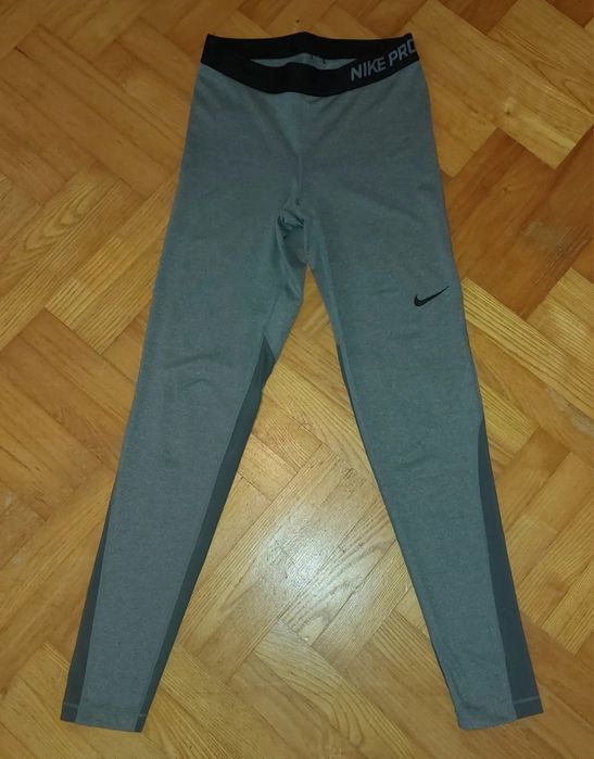 //Legginsy damskie szare sportowe Nike. M