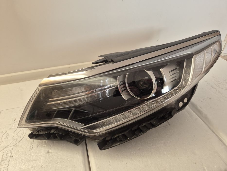 Kia Optima reflektor lewy xenon