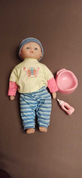 Lalka do przewijania karmienia ubierania mało używana nocnik i butelka