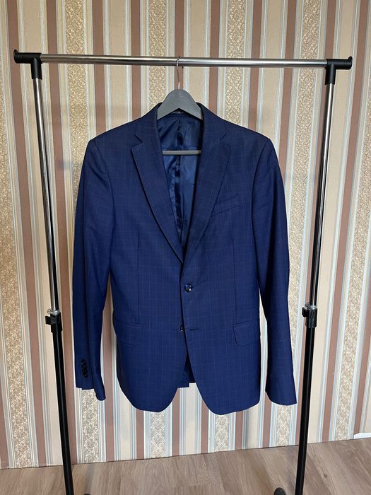 Костюм синій у клітинку