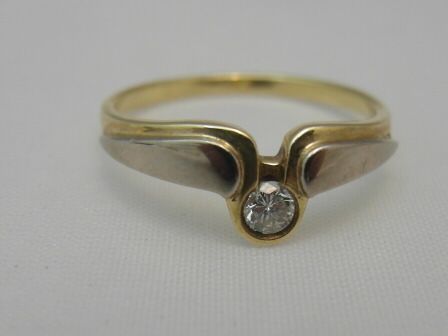 Złoty pierścionek z brylantem 2,80 g r 16