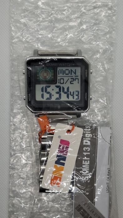 Nowy zegarek męski z widocznym CHIP marki SKMEI 2033 kolor srebrny