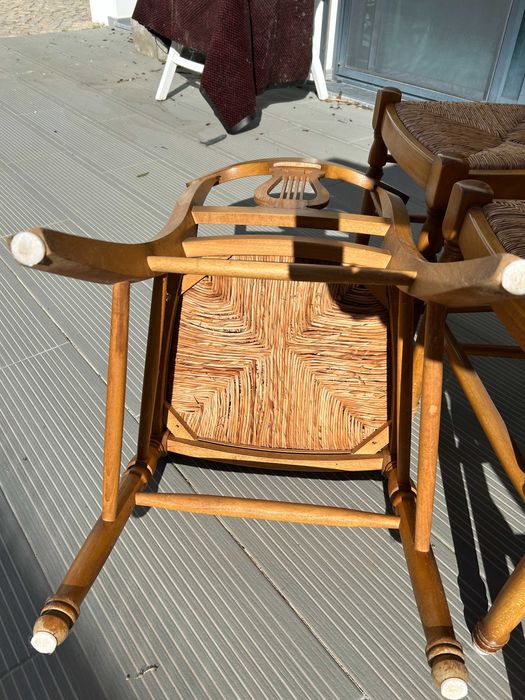 Four vintage dining room table chairs.