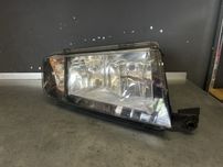Lampa prawa przód Skoda Fabia I lift 04-08r. Europa oryginał ciemna