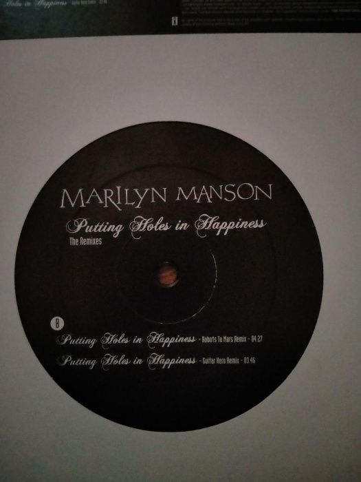 Marilyn Manson ‎– Putting Holes In Happiness