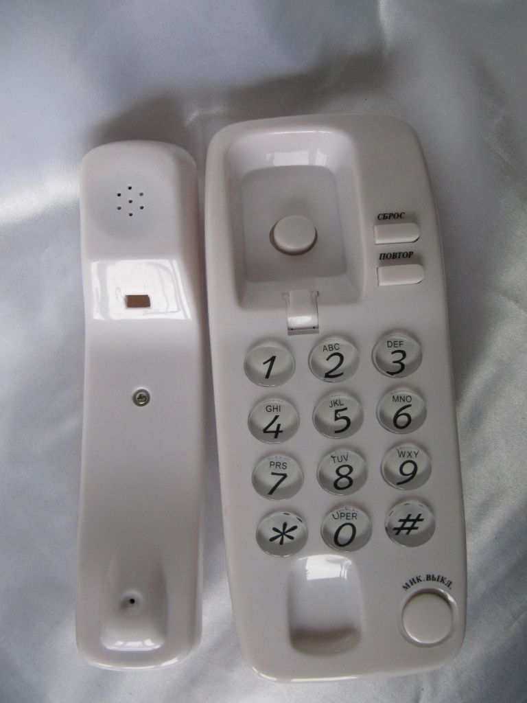 Телефон стационарный кнопочноый Jacobs MEE 9701,новый