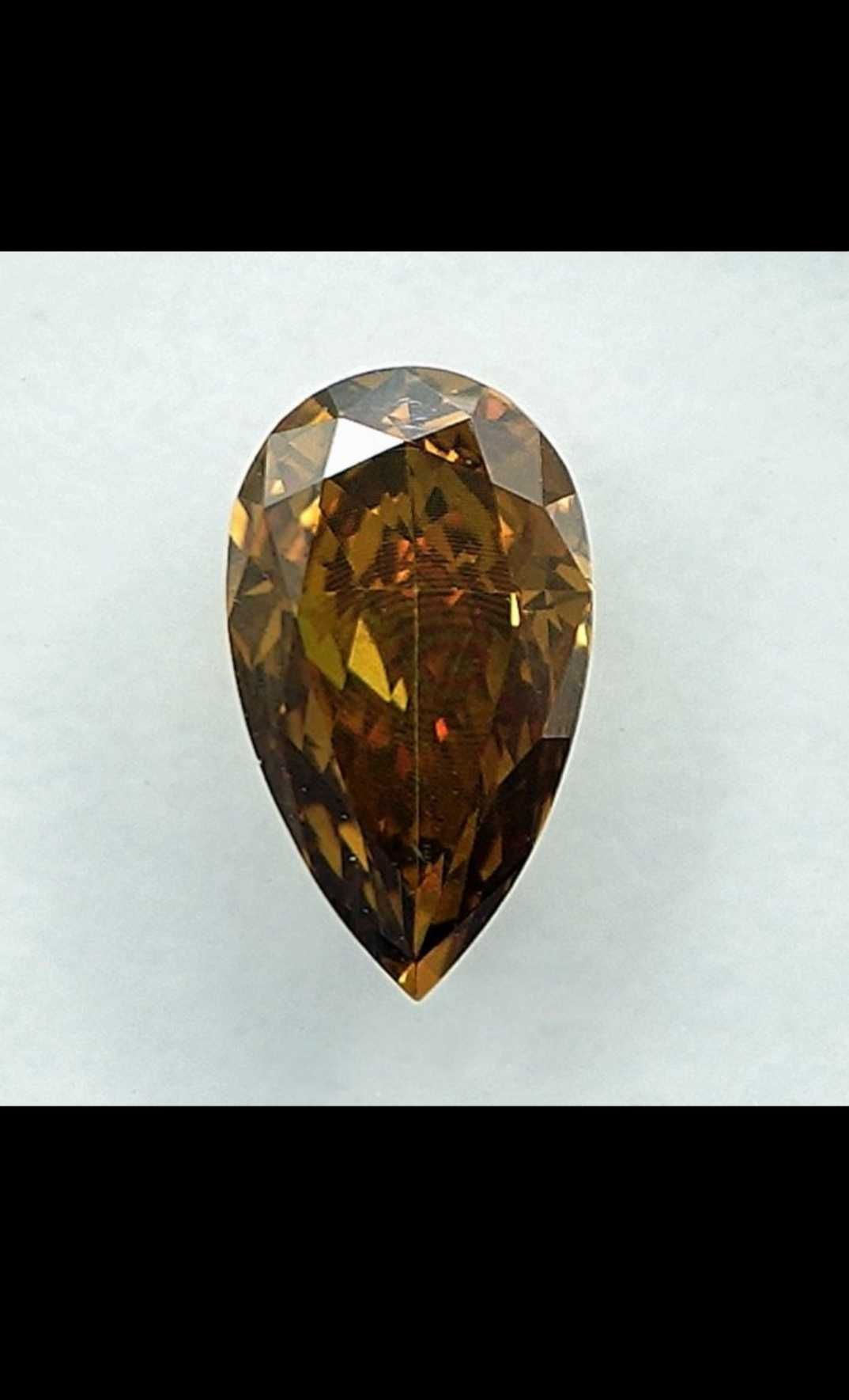 Diament 0,56 ct Fancy Brown Orange Yellow