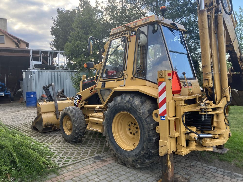 Koparko ładowarka Caterpillar 438