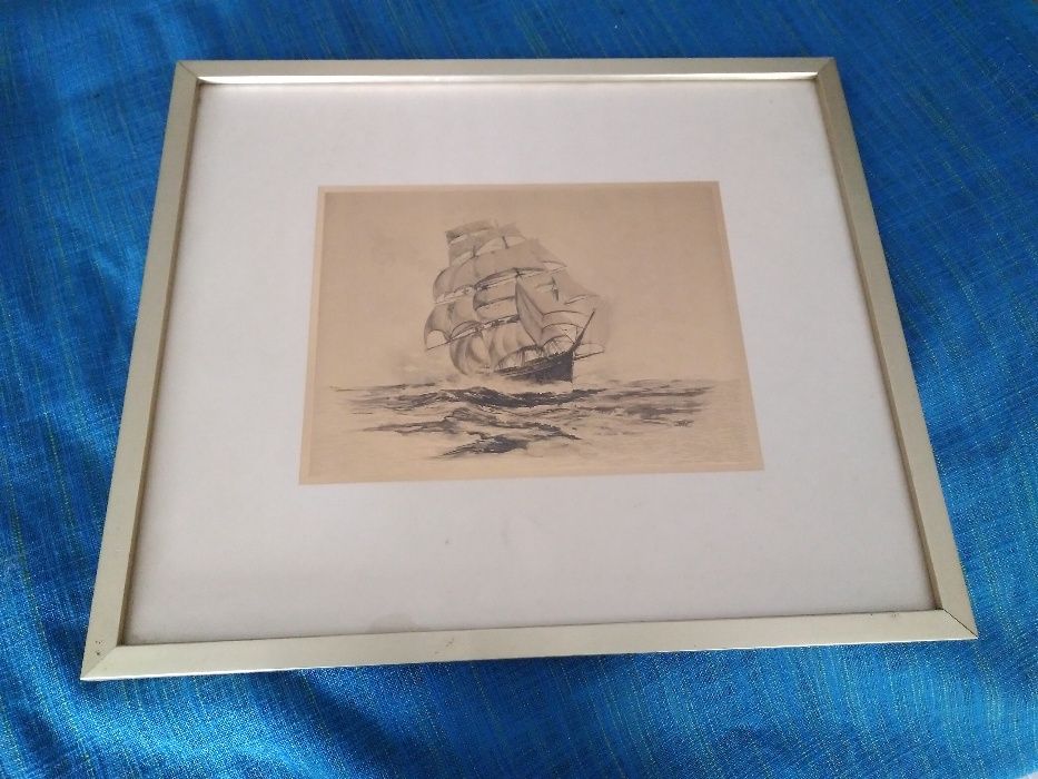 Quadro dourado de um barco