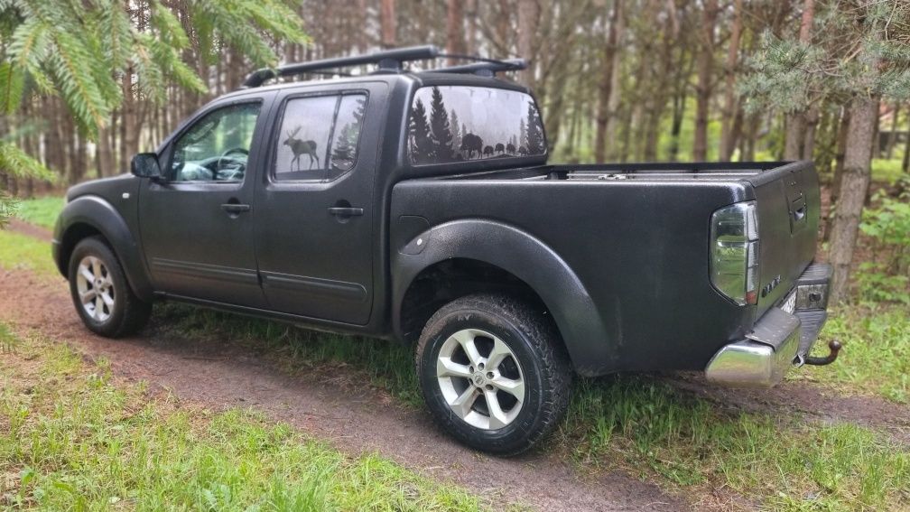 Nissan navara d40 raport