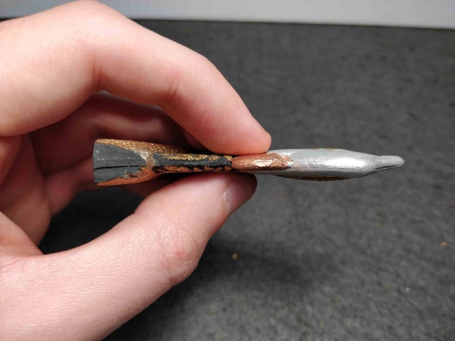 Stick de Tinta da China em Pedra . Forma de Pavão