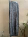 Calça clássica xadrez.