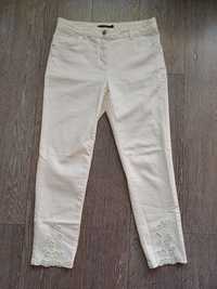 Białe/kremowe jeansy Monnari
