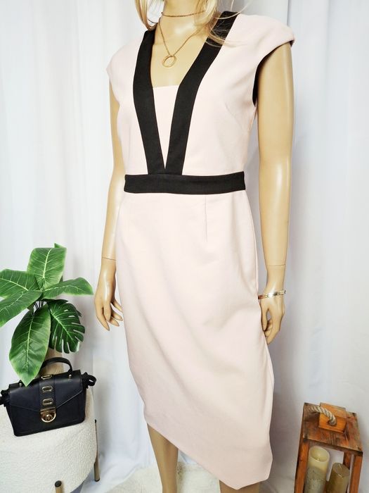 Różowa klasyczna sukienka midi z krótkim rękawem elegancka L 40