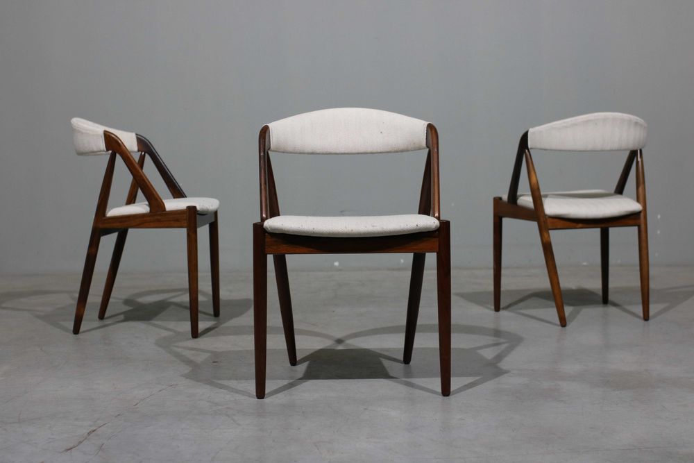 Cadeiras Kai Kristiansen modelo 31 em pau santo | Schou Andersen