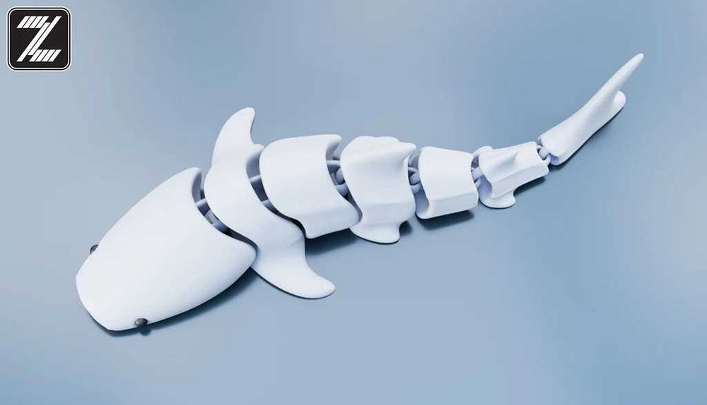 Подвижная игрушка в виде акулы