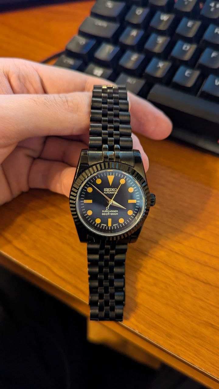 Seiko Preto e dourado