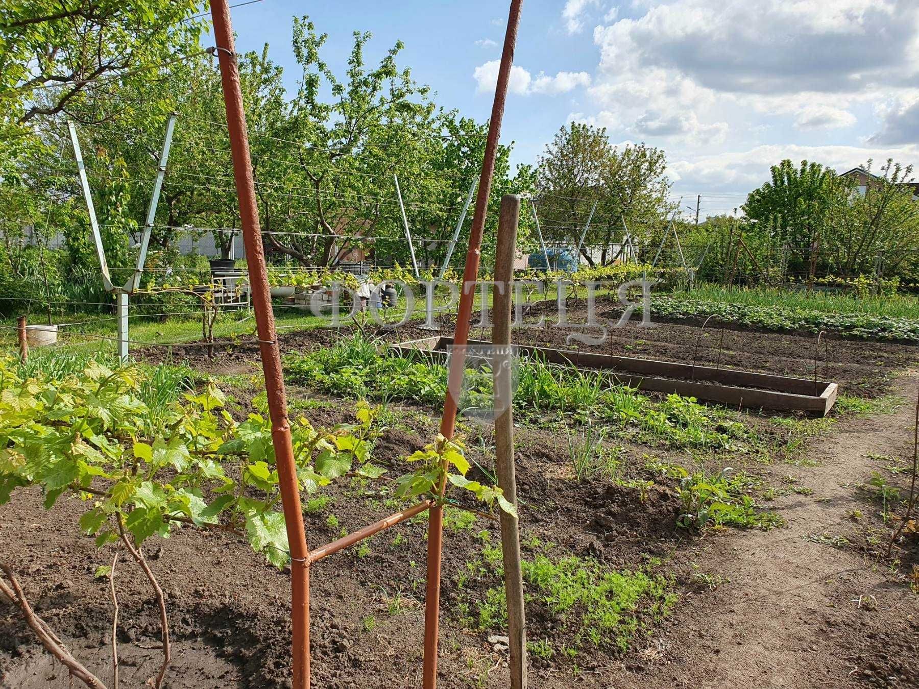 Продам жилой дом с гаражом в Подгородном