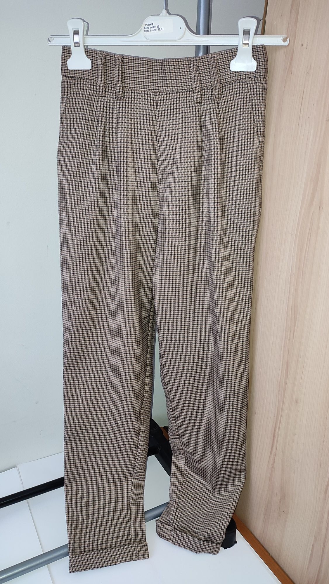 Eleganckie spodnie z wysokim stanem XS 164