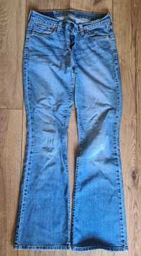 Jeansy niebieskie szerokie nogawki w30 S M