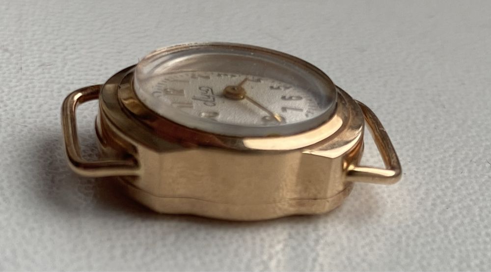 Золотий жіночий раритетний годинник