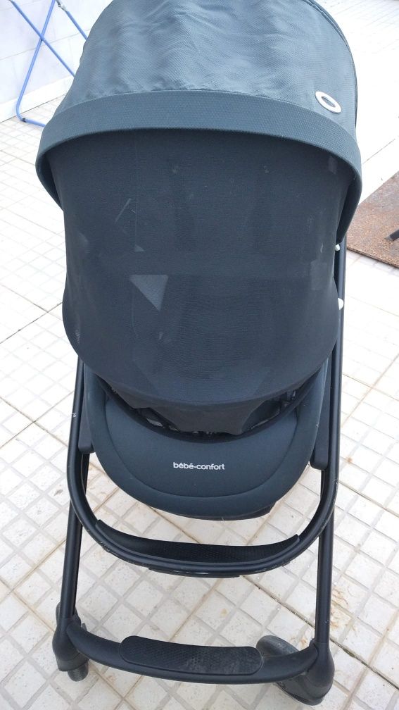 Carrinho de bebé com ovinho