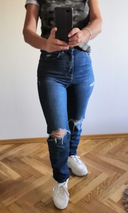 Spodnie jeansowe z dziurami stradivarius