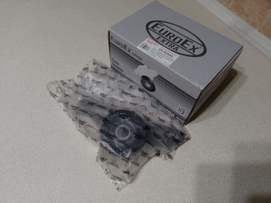 Новий натяжний ролик генератора Dacia (Renault) Sandero/Logan 1.4 - 1