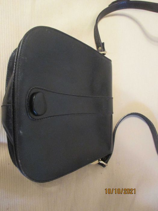 Mala pequena de pele para senhora