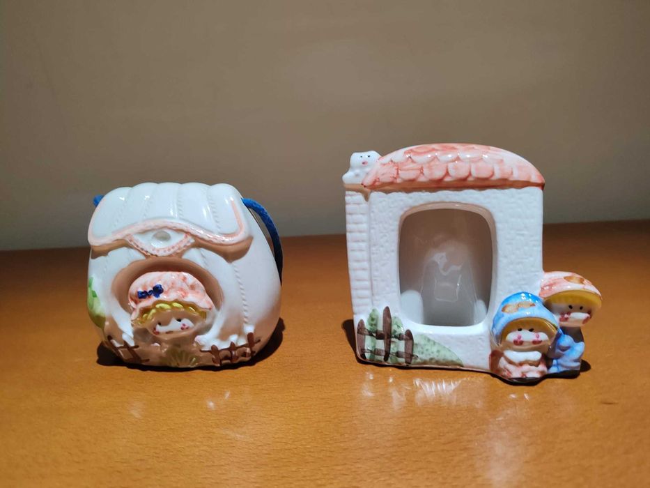 Conjunto de mealheiro e porta retratos em louça. Novo