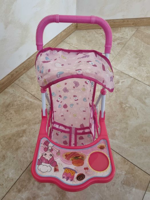 Іграшкова дитяча коляска для кукол