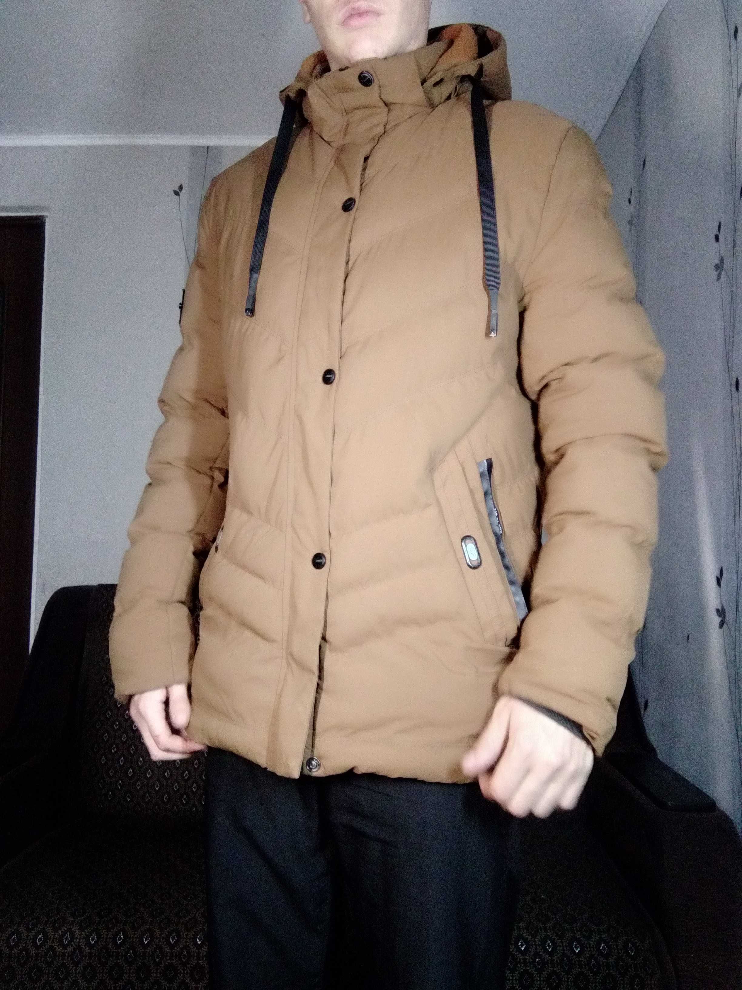Зимовий довгий пуховик
