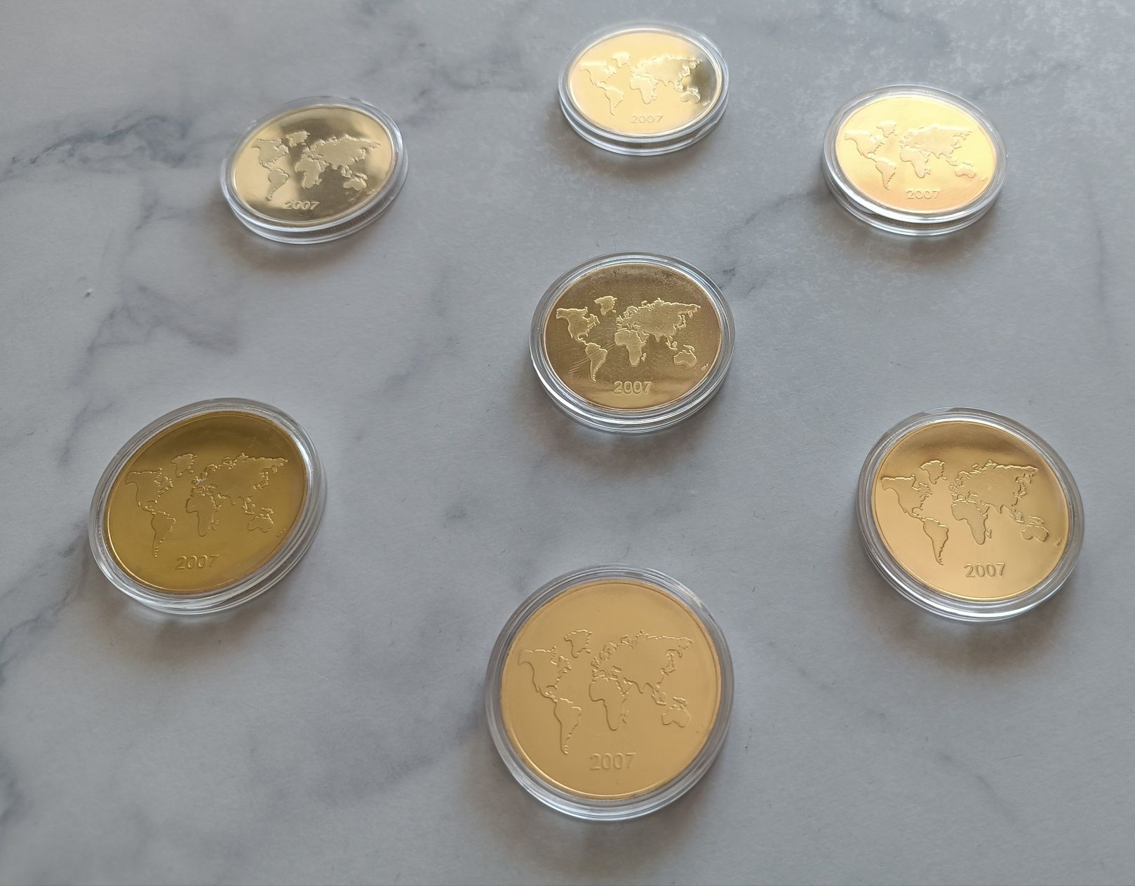 Piękna kolekcja monet - siedem współczesnych cudów świata.