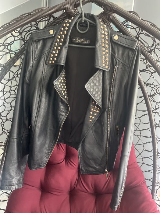 Кожана куртка жіноча