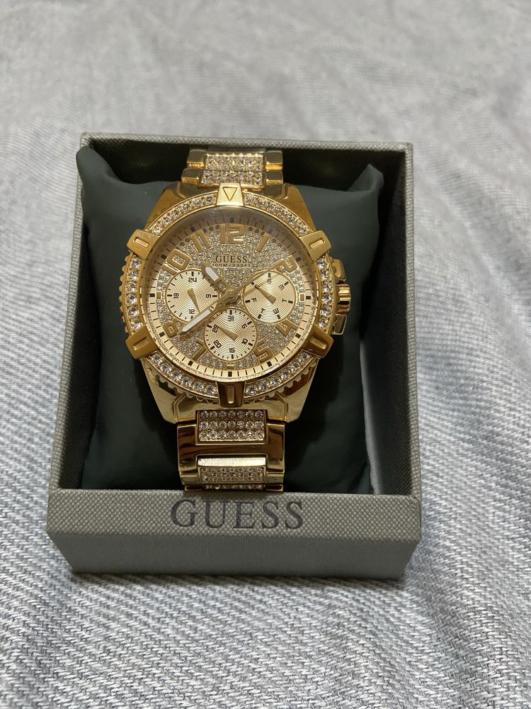 Relogio guess dourado