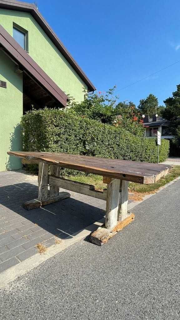Big wooden table and a big sofa