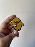 Emblema Duck with Knife
