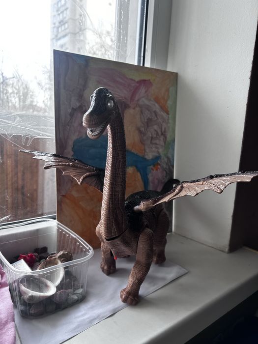 Дитяча іграшка динозавр ходить зі звуком