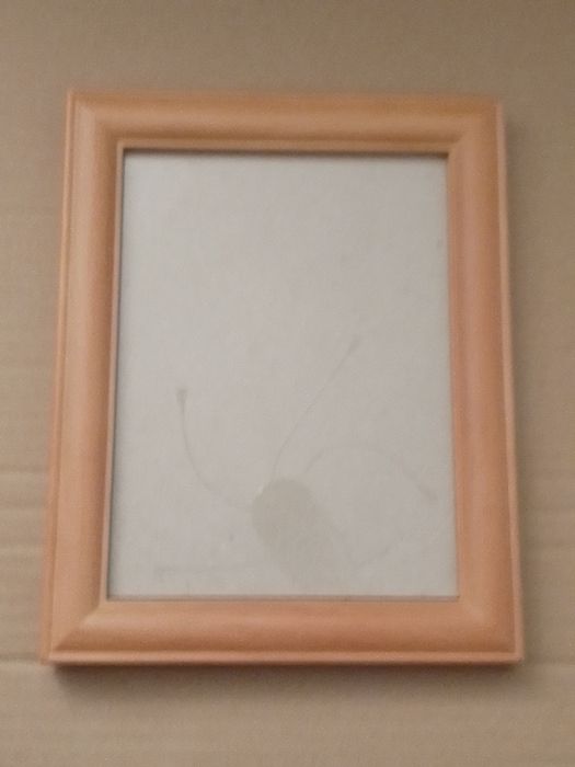 Moldura de madeira para fotos