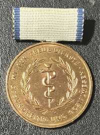 DDR Medal za wierną służbę w opiece zdrowotnej i społecznej - złoty